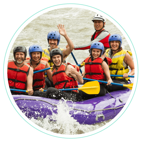 a round image of a group of people white water rafting in lake district, cumbria